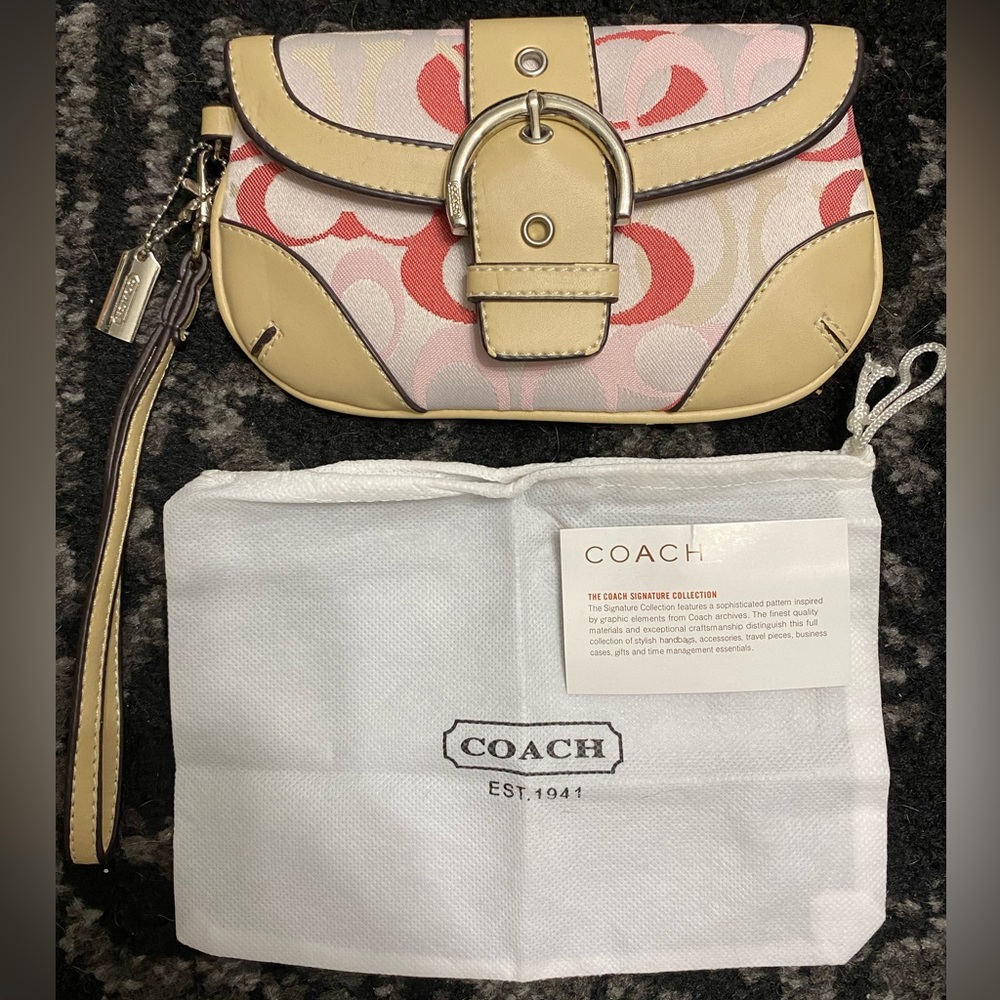 Pink Coach bag signature print wristlet purse